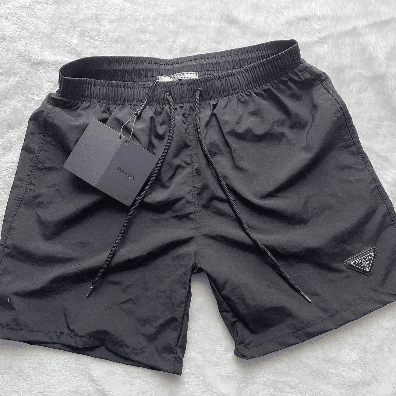 Prada Triangle Logo Shorts White with Black Triangle Patch — 1