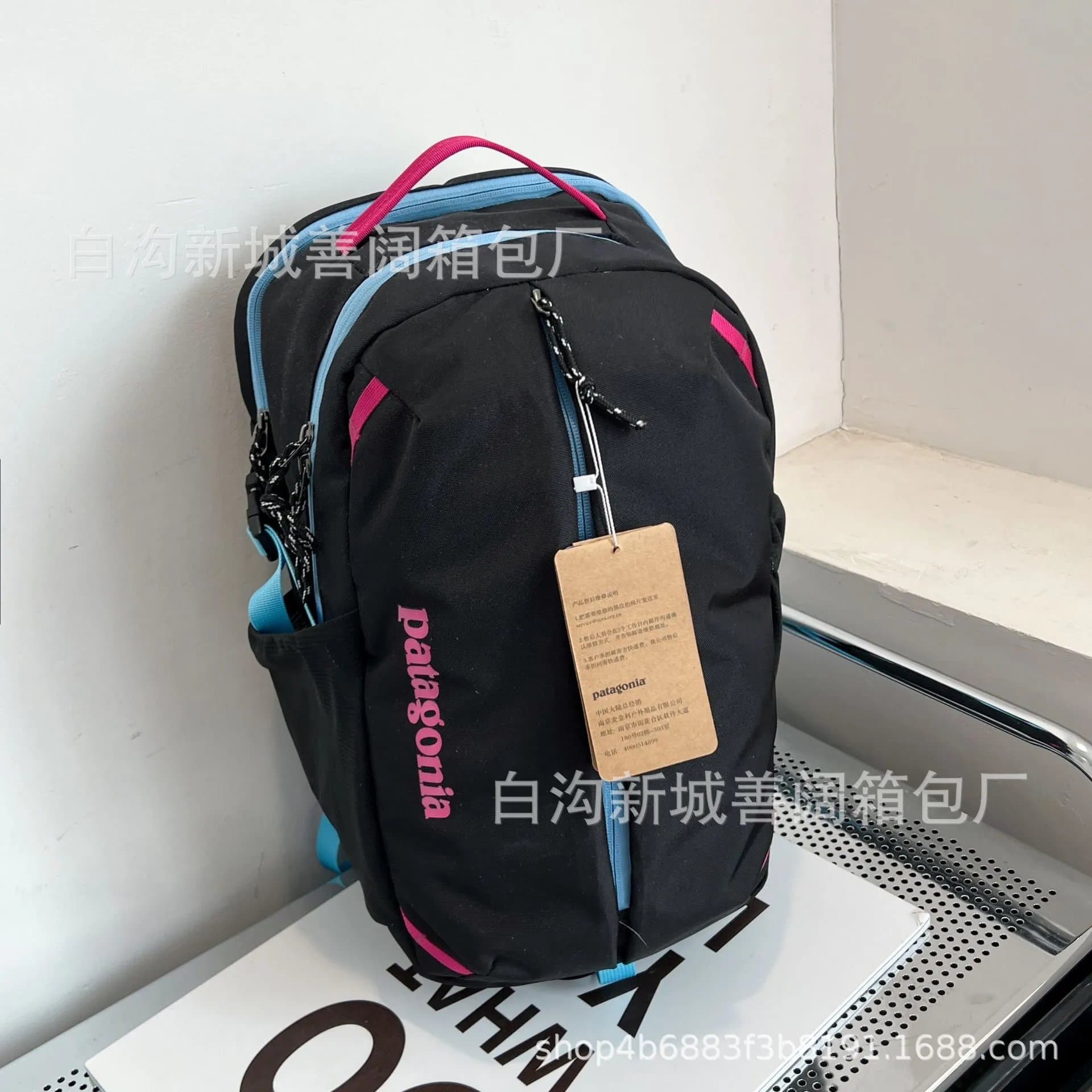 Patagonia Backpack Black with Pink and Blue Accents