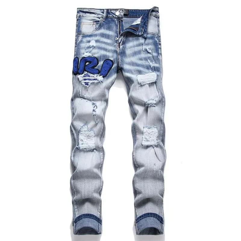 Amiri Distressed Jeans Patchwork Logo