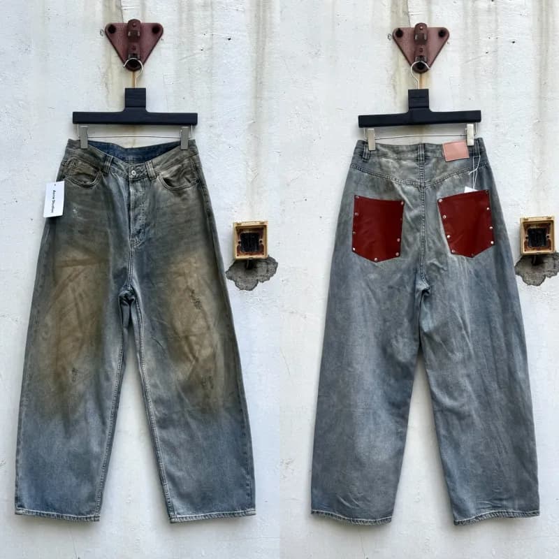 Denim Tears Wide-Leg Jeans Distressed with Leather Patches